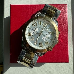 Michael Kors Silver and Gold Large Face Watch. Minor surface scratches (see pic)